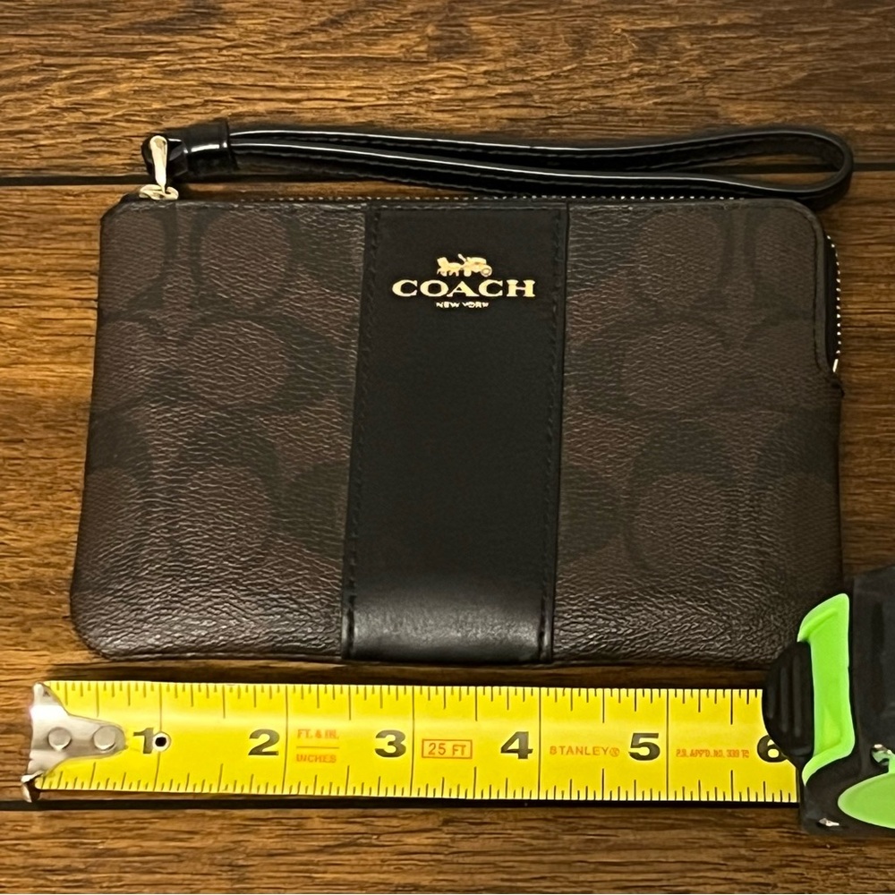 NWOT! Coach Chocolate Brown pvc small wristlet. Great gift.
